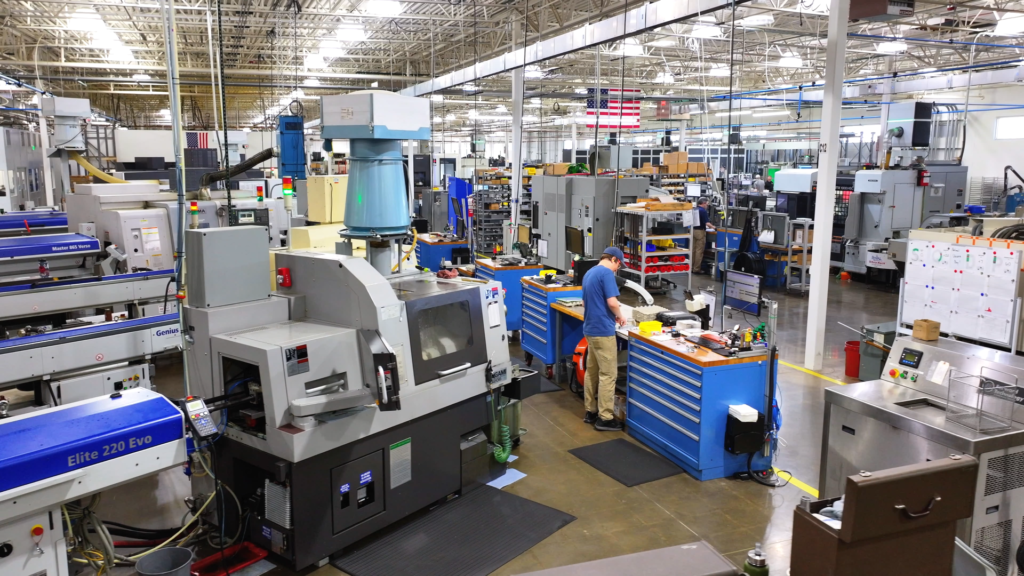 Industrial CNC machining facility with automated equipment, workstations, and manufacturing machinery