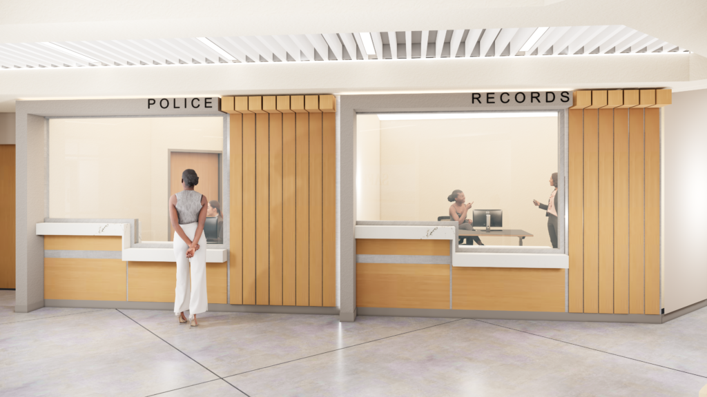 Modern police and records office reception area with service counters, glass windows, and wood panel walls