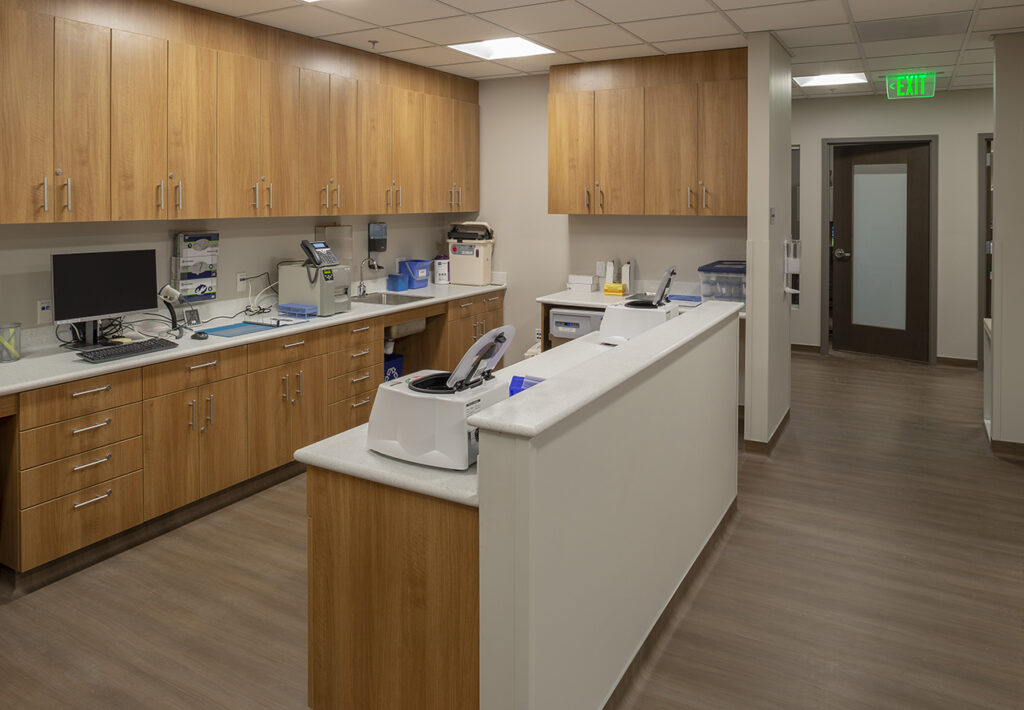 Modern medical laboratory interior with healthcare workstations and clinical equipment design