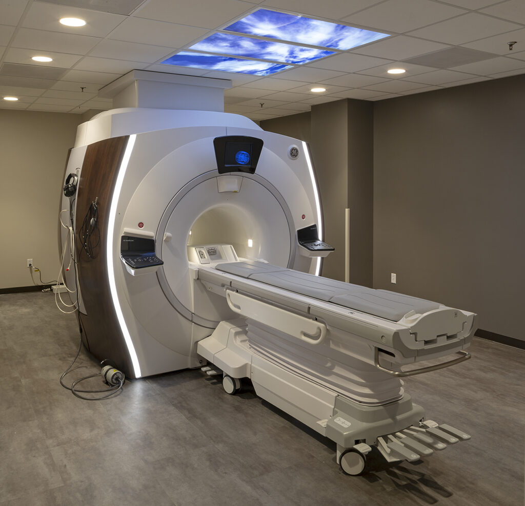 Modern MRI imaging room with medical scanning equipment and contemporary healthcare interior design