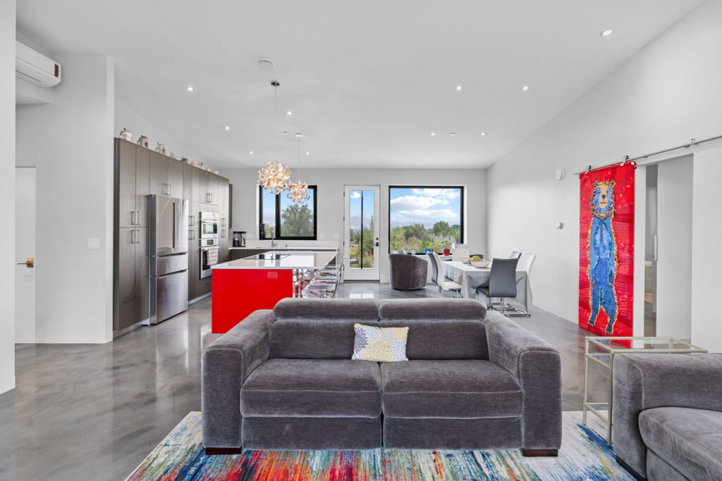 PEH Architects open plan home interior with modern kitchen living and dining space